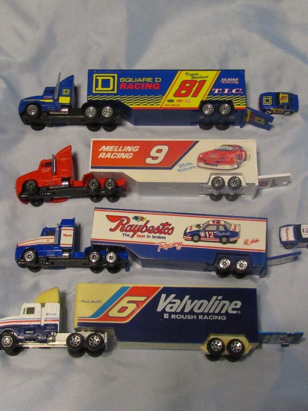 Lot 4 1990s RACING CHAMPIONS RACING NASCAR TRANSPORTER TRUCKS Valvoline Melling+